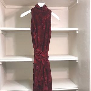 A warped dress with fabric belt to wrap around it